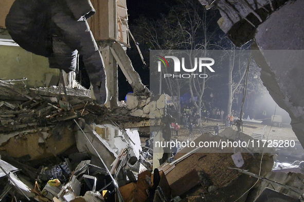 A section of a nine-storey residential building is destroyed by a Russian glide bomb in Kharkiv, Ukraine, on October 31, 2024. An 11-year-ol...