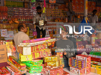 People buy firecrackers for the Diwali festival, the Hindu festival of lights, in Hyderabad, India, on October 31, 2024. (