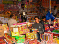 People buy firecrackers for the Diwali festival, the Hindu festival of lights, in Hyderabad, India, on October 31, 2024. (