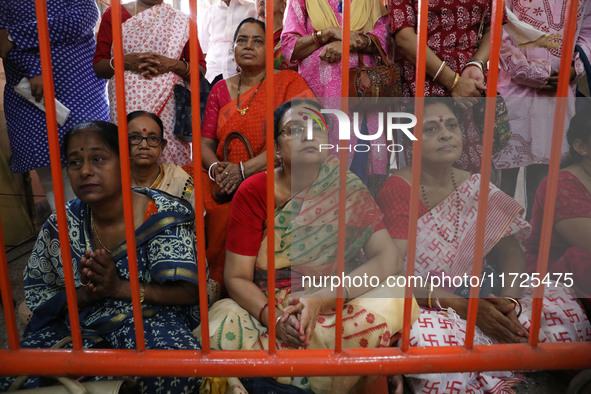 Ridhima Jana, a 9-year-old girl dressed as a Kumari, is worshiped by devotees during rituals to celebrate the Hindu festival of Kali Puja at...