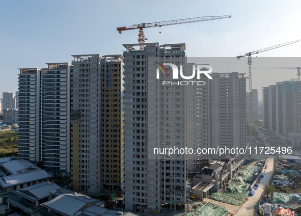 A building under construction by China Overseas Property is for sale in Qingjiangpu district, Huai 'an city, Jiangsu province, on October 31...