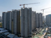 A building under construction by China Overseas Property is for sale in Qingjiangpu district, Huai 'an city, Jiangsu province, on October 31...