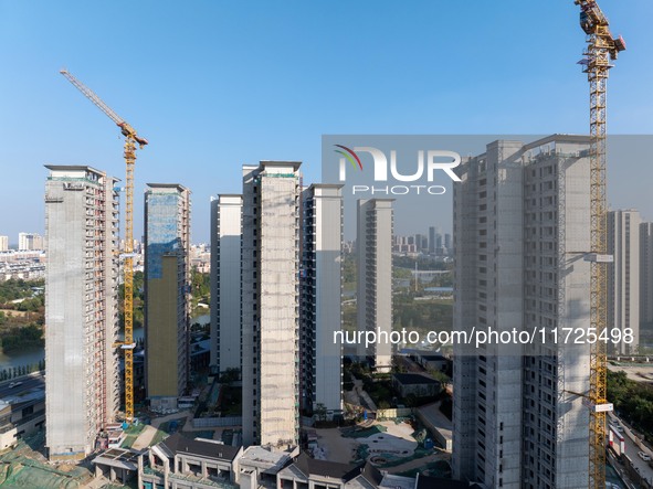 A building under construction by China Overseas Property is for sale in Qingjiangpu district, Huai 'an city, Jiangsu province, on October 31...