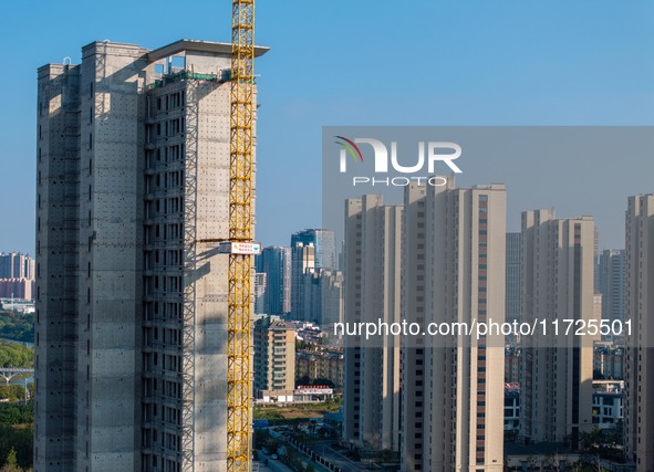 A building under construction by China Overseas Property is for sale in Qingjiangpu district, Huai 'an city, Jiangsu province, on October 31...