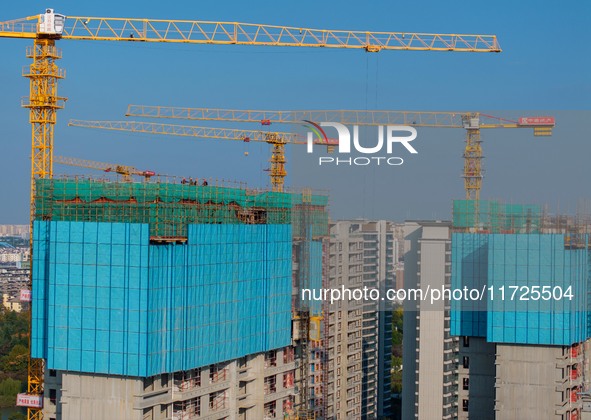 A building under construction by China Overseas Property is for sale in Qingjiangpu district, Huai 'an city, Jiangsu province, on October 31...