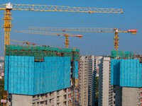 A building under construction by China Overseas Property is for sale in Qingjiangpu district, Huai 'an city, Jiangsu province, on October 31...