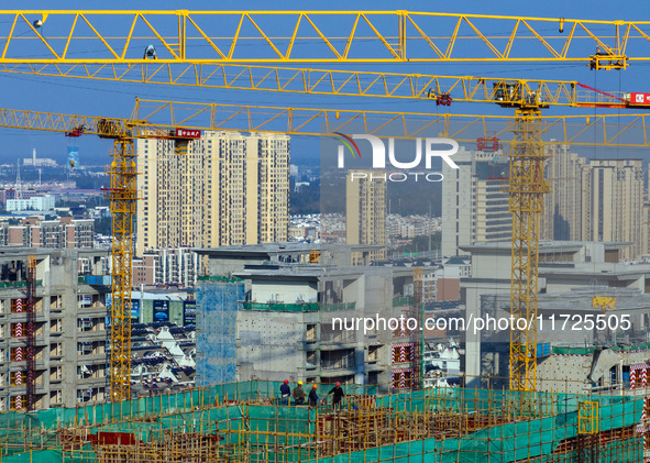 A building under construction by China Overseas Property is for sale in Qingjiangpu district, Huai 'an city, Jiangsu province, on October 31...