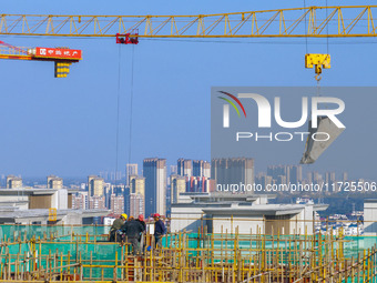 A building under construction by China Overseas Property is for sale in Qingjiangpu district, Huai 'an city, Jiangsu province, on October 31...