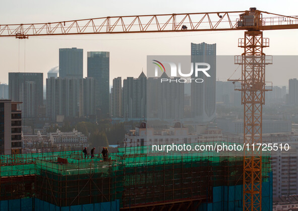 A building under construction by China Overseas Property is for sale in Qingjiangpu district, Huai 'an city, Jiangsu province, on October 31...