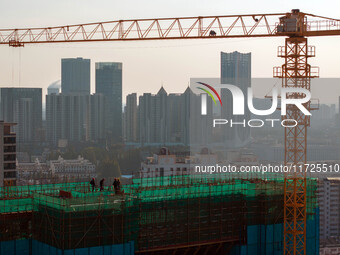 A building under construction by China Overseas Property is for sale in Qingjiangpu district, Huai 'an city, Jiangsu province, on October 31...