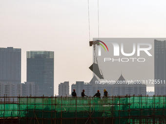 A building under construction by China Overseas Property is for sale in Qingjiangpu district, Huai 'an city, Jiangsu province, on October 31...