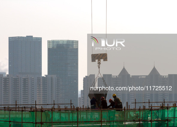 A building under construction by China Overseas Property is for sale in Qingjiangpu district, Huai 'an city, Jiangsu province, on October 31...