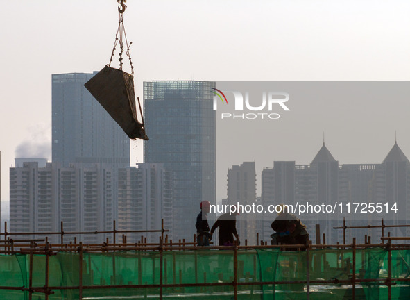 A building under construction by China Overseas Property is for sale in Qingjiangpu district, Huai 'an city, Jiangsu province, on October 31...