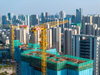 A building under construction by China Overseas Property is for sale in Qingjiangpu district, Huai 'an city, Jiangsu province, on October 31...