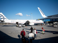 An Aegean airplane is at Athens airport in Greece on October 31, 2024. (