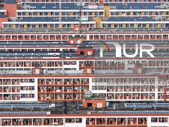 An aerial photo shows solar PV on the roof of the dormitory building of Jiangsu Agricultural and Animal Husbandry Technical College in Taizh...