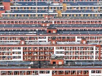 An aerial photo shows solar PV on the roof of the dormitory building of Jiangsu Agricultural and Animal Husbandry Technical College in Taizh...