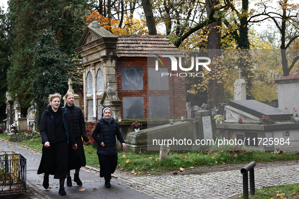 Nuns walk at the Rakowicki Cemetery a day ahead of the All Saints Day in Krakow, Poland on October 31, 2024. 