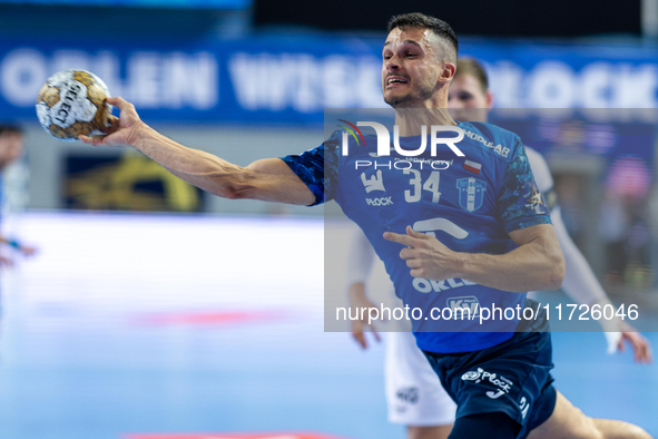 Lovro Mihic  is playing during the match EHF Champions League Men match between  Orlen Wisla Plock and Veszprem HC in Plock, Poland on Octob...