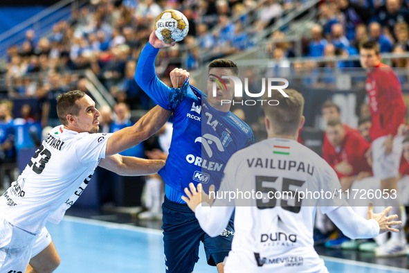 Patrik Ligetvari and Gergo Fazekas  are playing during the match EHF Champions League Men match between  Orlen Wisla Plock and Veszprem HC i...