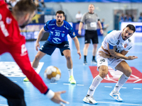 Hugo Descat  is playing during the match EHF Champions League Men match between  Orlen Wisla Plock and Veszprem HC in Plock, Poland on Octob...