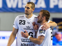 Patrik Ligetvari and Luka Cindric are playing during the match EHF Champions League Men match between  Orlen Wisla Plock and Veszprem HC in...