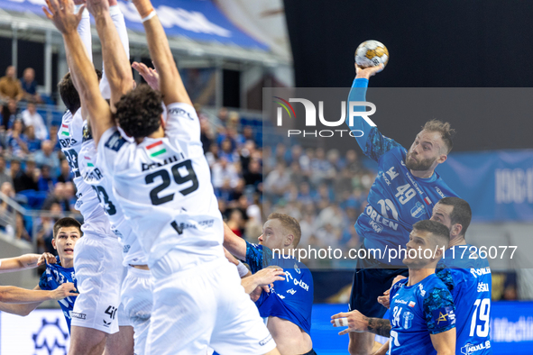 Zoltan Szita  is playing during the match EHF Champions League Men match between  Orlen Wisla Plock and Veszprem HC in Plock, Poland on Octo...