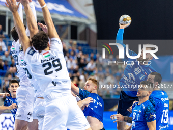 Zoltan Szita  is playing during the match EHF Champions League Men match between  Orlen Wisla Plock and Veszprem HC in Plock, Poland on Octo...