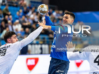 Ludovic Fabregas and Gergo Fazekas are playing during the match EHF Champions League Men match between  Orlen Wisla Plock and Veszprem HC in...