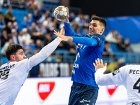 Ludovic Fabregas and Gergo Fazekas are playing during the match EHF Champions League Men match between  Orlen Wisla Plock and Veszprem HC in...