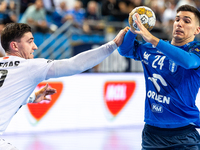 Ludovic Fabregas and Gergo Fazekas are playing during the match EHF Champions League Men match between  Orlen Wisla Plock and Veszprem HC in...