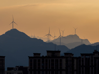 A wind power plant operates at Liangfengya in the Nanchuan district of Chongqing, China, on October 30, 2024. (