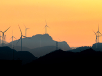 A wind power plant operates at Liangfengya in the Nanchuan district of Chongqing, China, on October 30, 2024. (