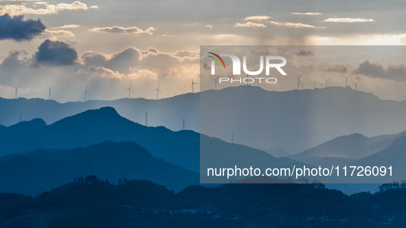 A wind power plant operates at Liangfengya in the Nanchuan district of Chongqing, China, on October 30, 2024. 