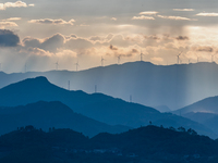 A wind power plant operates at Liangfengya in the Nanchuan district of Chongqing, China, on October 30, 2024. (