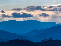 A wind power plant operates at Liangfengya in the Nanchuan district of Chongqing, China, on October 30, 2024. (