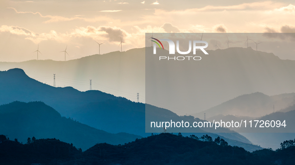 A wind power plant operates at Liangfengya in the Nanchuan district of Chongqing, China, on October 30, 2024. 