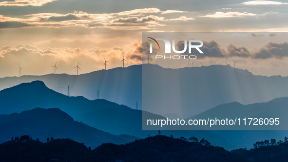 A wind power plant operates at Liangfengya in the Nanchuan district of Chongqing, China, on October 30, 2024. 