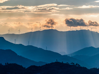 A wind power plant operates at Liangfengya in the Nanchuan district of Chongqing, China, on October 30, 2024. (