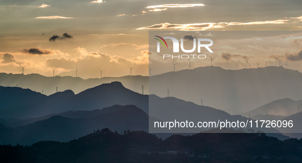 A wind power plant operates at Liangfengya in the Nanchuan district of Chongqing, China, on October 30, 2024. 