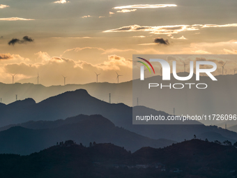 A wind power plant operates at Liangfengya in the Nanchuan district of Chongqing, China, on October 30, 2024. (