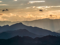 A wind power plant operates at Liangfengya in the Nanchuan district of Chongqing, China, on October 30, 2024. (