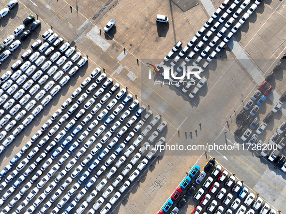 A large number of vehicles gather for loading at the terminal of Oriental Port Branch in Lianyungang Port in Lianyungang, China, on October...