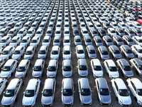 A large number of vehicles gather for loading at the terminal of Oriental Port Branch in Lianyungang Port in Lianyungang, China, on October...