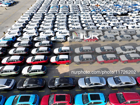 A large number of vehicles gather for loading at the terminal of Oriental Port Branch in Lianyungang Port in Lianyungang, China, on October...