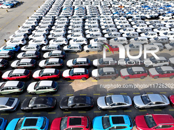 A large number of vehicles gather for loading at the terminal of Oriental Port Branch in Lianyungang Port in Lianyungang, China, on October...