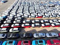 A large number of vehicles gather for loading at the terminal of Oriental Port Branch in Lianyungang Port in Lianyungang, China, on October...