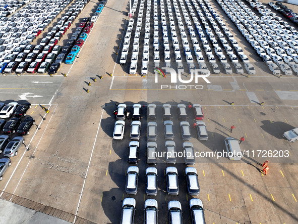 A large number of vehicles gather for loading at the terminal of Oriental Port Branch in Lianyungang Port in Lianyungang, China, on October...