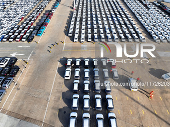 A large number of vehicles gather for loading at the terminal of Oriental Port Branch in Lianyungang Port in Lianyungang, China, on October...