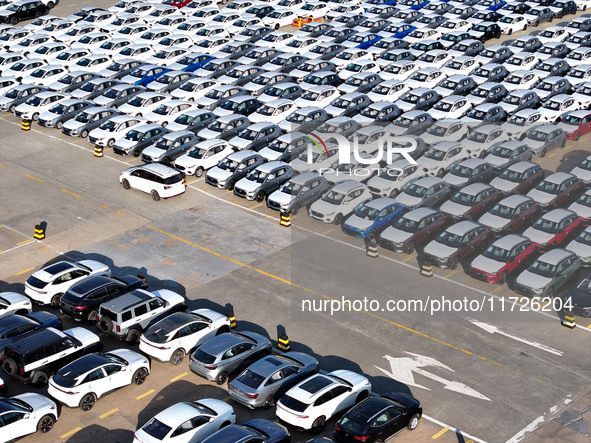 A large number of vehicles gather for loading at the terminal of Oriental Port Branch in Lianyungang Port in Lianyungang, China, on October...